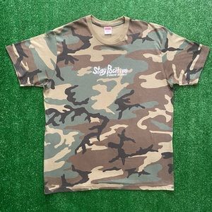 Supreme Positive Tee